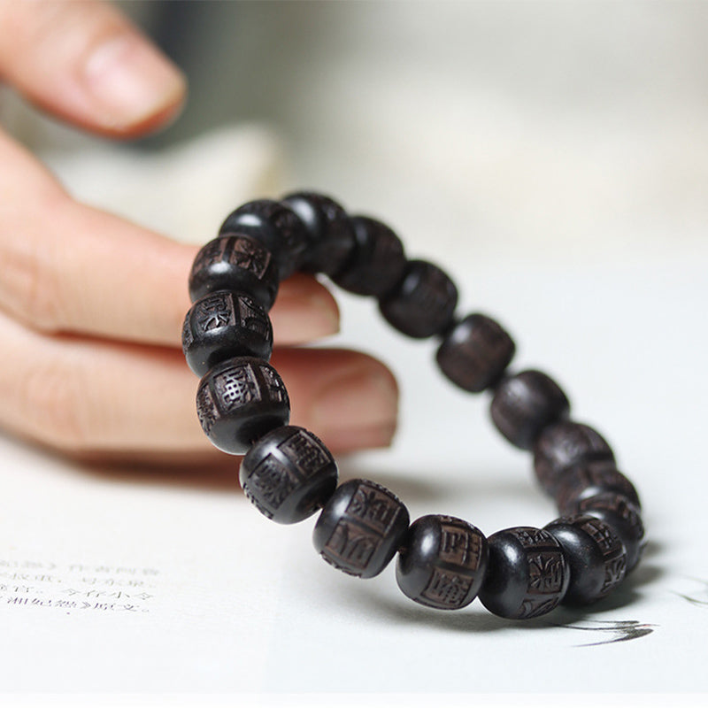 Buddha Stonesチベット黒檀オーム・マニ・パドメ・フム彫刻 バランスブレスレット