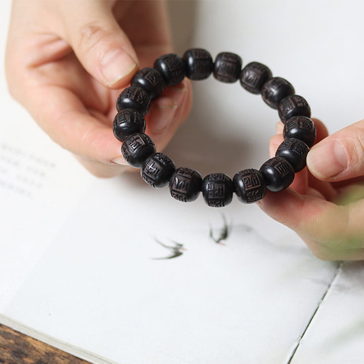 Buddha Stonesチベット黒檀オーム・マニ・パドメ・フム彫刻 バランスブレスレット