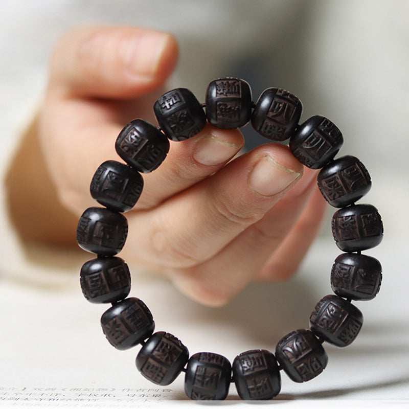 Buddha Stonesチベット黒檀オーム・マニ・パドメ・フム彫刻 バランスブレスレット