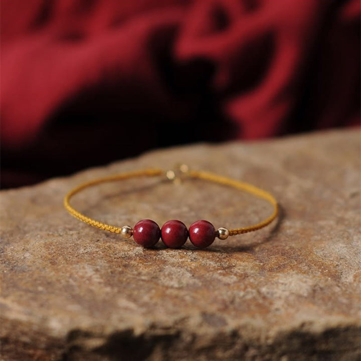 Buddha Stones14K ゴールドメッキ 天然辰砂 祝福紐 編み込みブレスレット