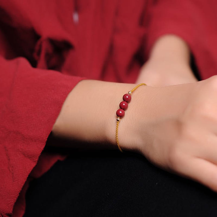 Buddha Stones14K ゴールドメッキ 天然辰砂 祝福紐 編み込みブレスレット