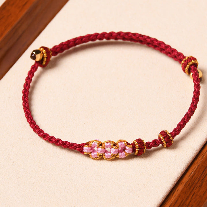 Buddha Stones手作りの桃の花の守護編みロープブレスレット
