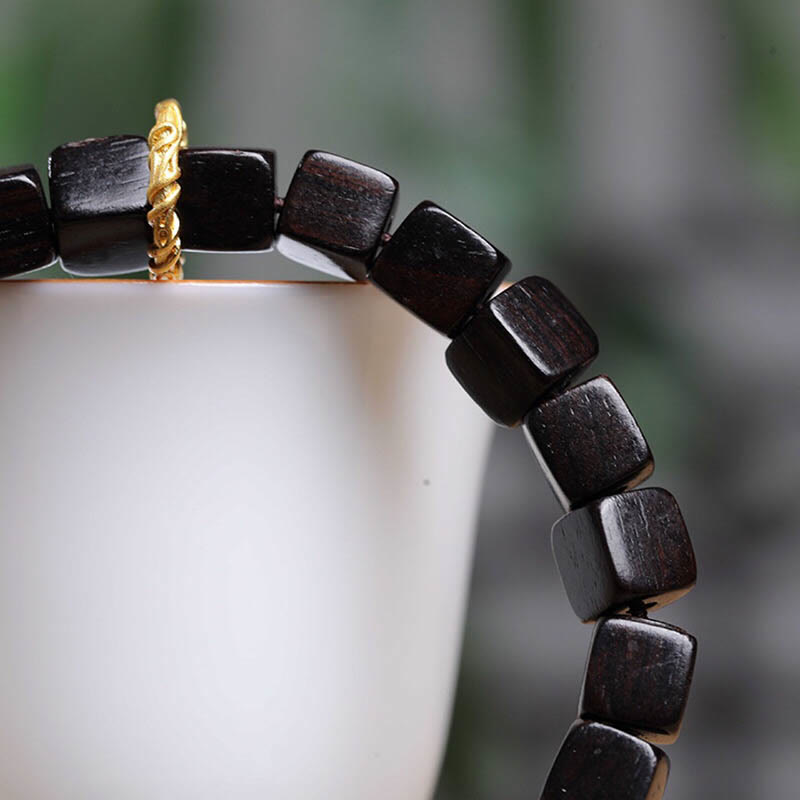 Buddha Stonesチベット黒檀 スクエアビーズ 平和 穏やか ブレスレット