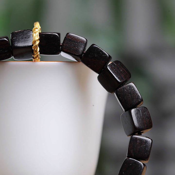 Buddha Stonesチベット黒檀 スクエアビーズ 平和 穏やか ブレスレット