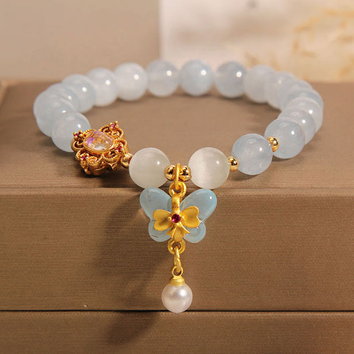 Buddha Stonesアクアマリン キャッツアイ ヒーリングバタフライパール チャームブレスレット