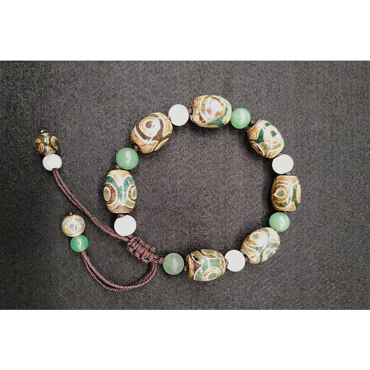 Buddha Stonesチベット三眼ビーズ幸運保護編み込みブレスレット
