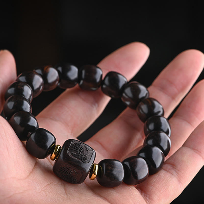 Buddha Stonesチベット黒檀バレルビーズ幸運と宝物バランスブレスレット