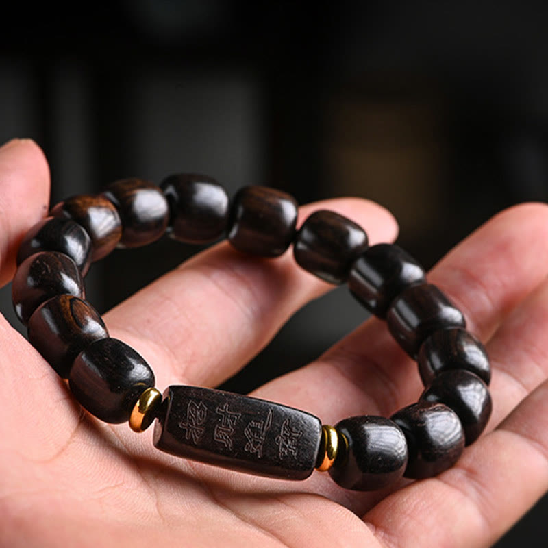 Buddha Stonesチベット黒檀バレルビーズ幸運と宝物バランスブレスレット