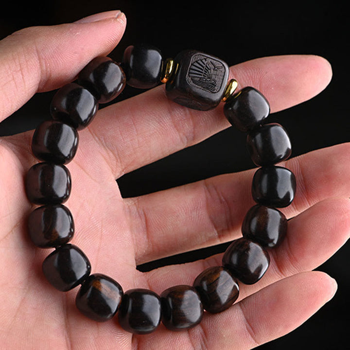 Buddha Stonesチベット黒檀バレルビーズ幸運と宝物バランスブレスレット