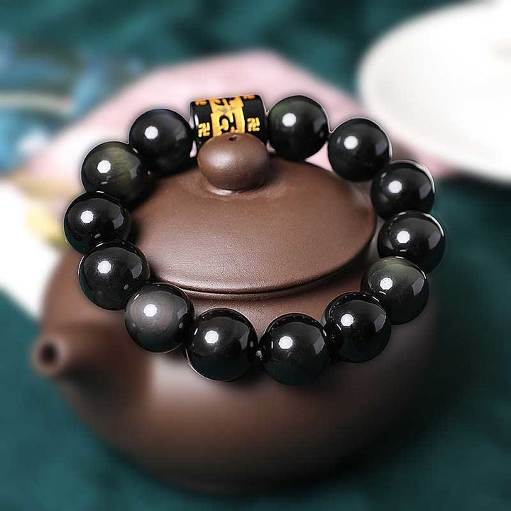 Buddha Stonesレインボーオブシディアンオーム・マニ・パドメ・フムスワスティカ幸運を呼ぶブレスレット