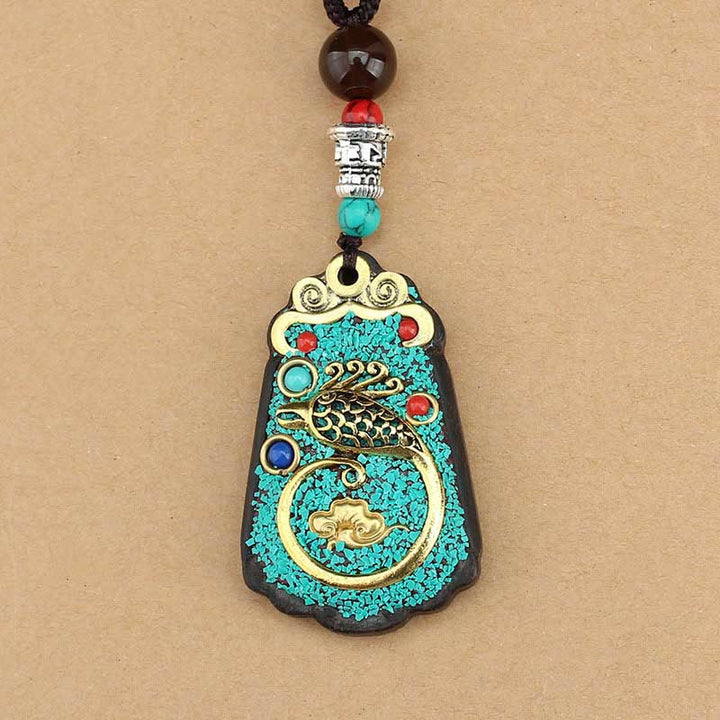 Buddha Stonesチベット 富の神 金の樹 黄金の鳳凰 タンカ 黒檀 平和のネックレス ペンダント