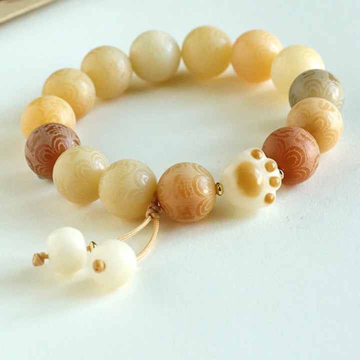 Buddha Stones菩提樹の種子オーム・マニ・パドメ・フム彫刻ハーモニーブレスレット