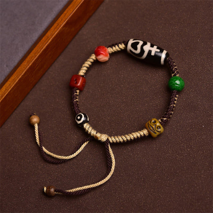 Buddha Stones手作り チベット Dzi ビーズ 富 編み込み ロープ ブレスレット