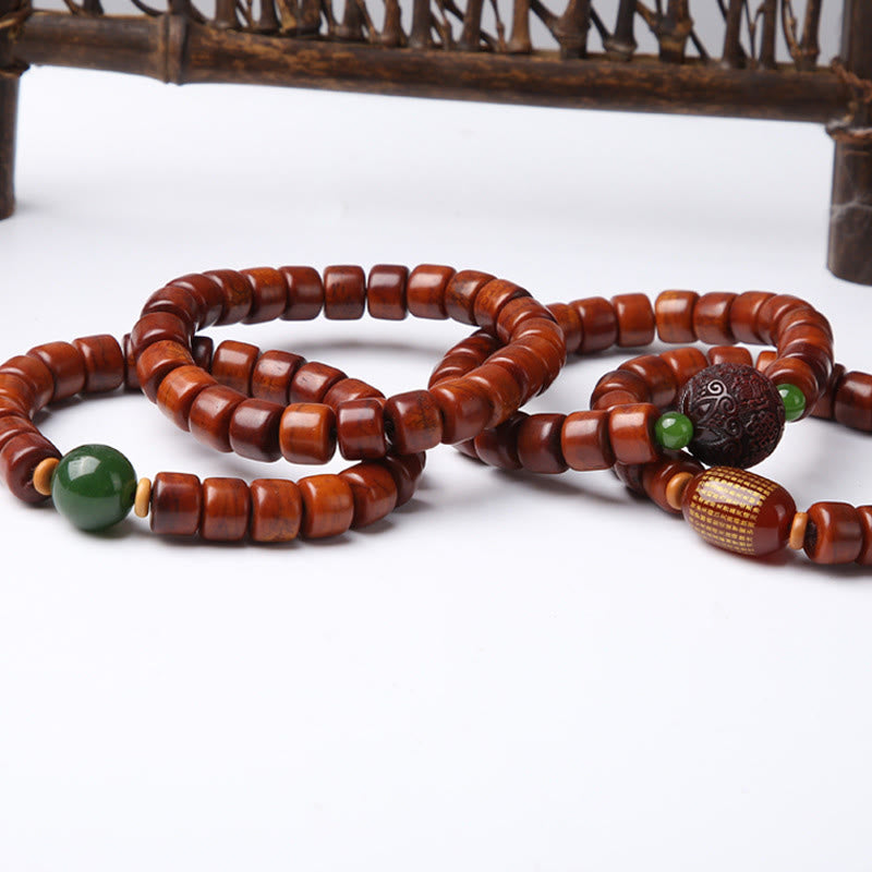 Buddha Stonesチベット骨ビーズ 三目ビーズ 羊の角 赤瑪瑙 強さのブレスレット