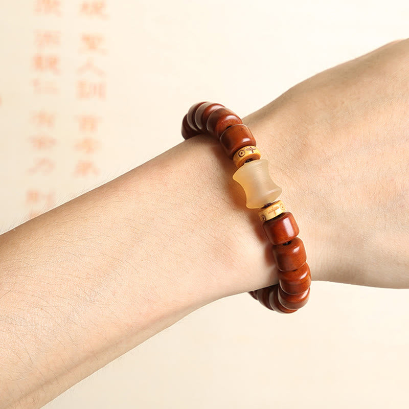 Buddha Stonesチベット骨ビーズ 三目ビーズ 羊の角 赤瑪瑙 強さのブレスレット