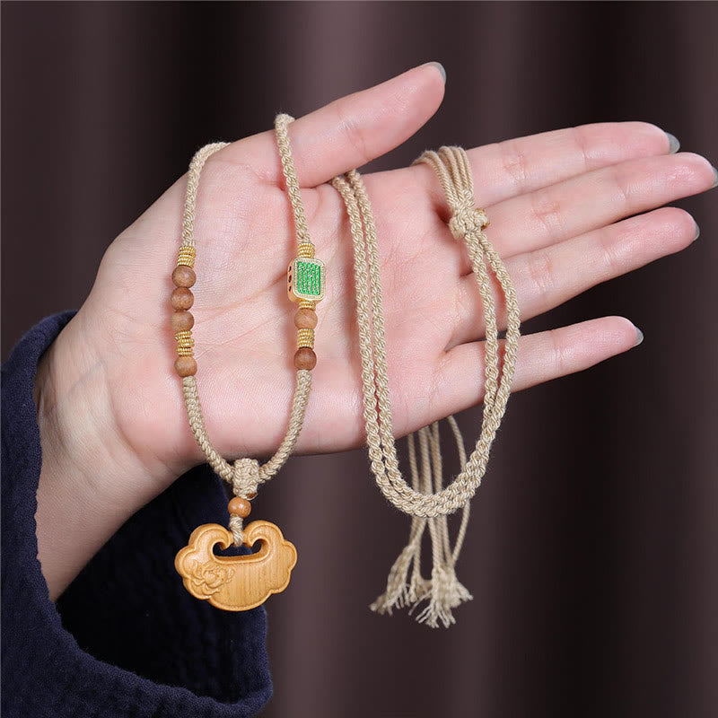 Buddha Stonesチベットサンダルウッド中国ロックチャーム保護ネックレスペンダント