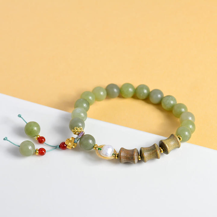 Buddha Stones、翡翠、白檀、竹、真珠の繁栄のブレスレット