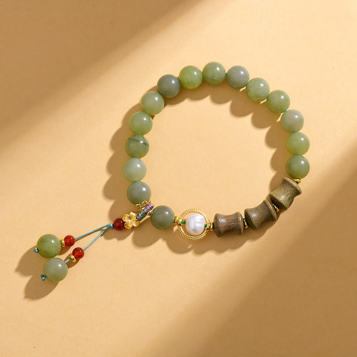 Buddha Stones、翡翠、白檀、竹、真珠の繁栄のブレスレット
