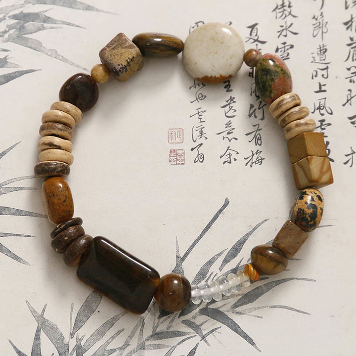 Buddha Stonesココナッツシェルタイガーアイ勇気ブレスレット