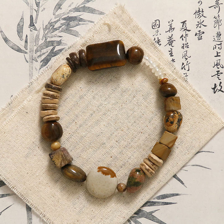 Buddha Stonesココナッツシェルタイガーアイ勇気ブレスレット