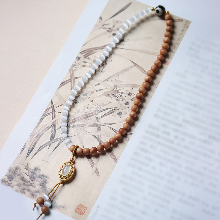 Buddha Stonesサンダルウッドキャッツアイ三眼ビーズクリスタルプロテクションブレスレット