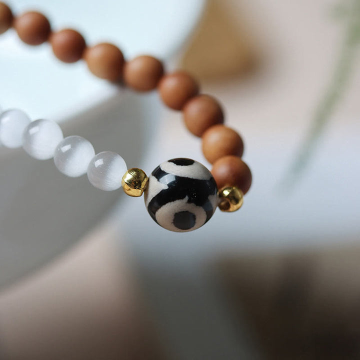Buddha Stonesサンダルウッドキャッツアイ三眼ビーズクリスタルプロテクションブレスレット