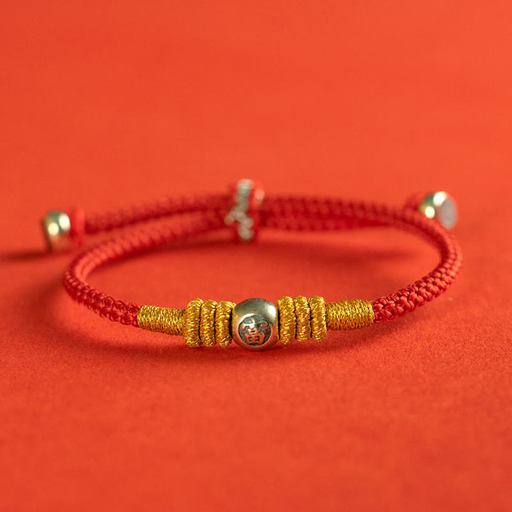 Buddha Stonesの赤い糸の漢字の守護ブレスレット