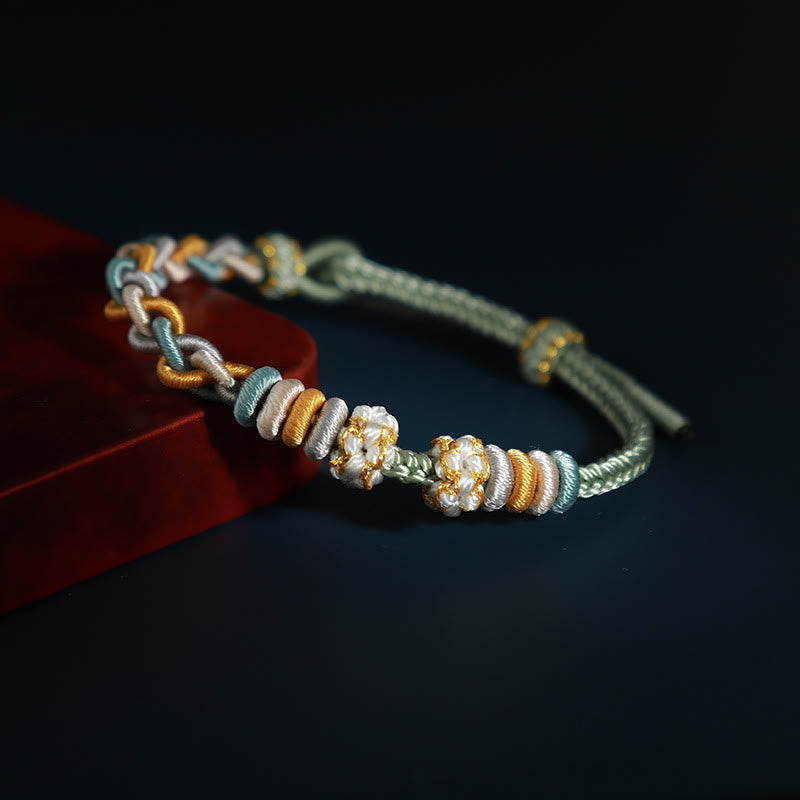 Buddha Stonesの4連桃の花のつながりブレスレット