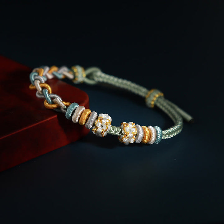 Buddha Stonesの4連桃の花のつながりブレスレット