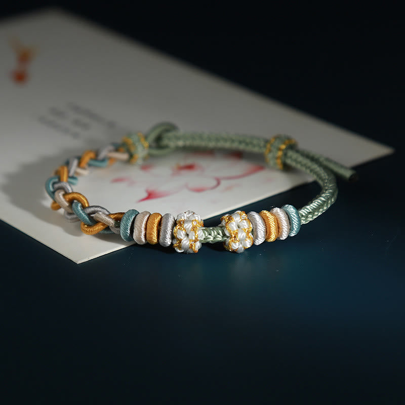 Buddha Stonesの4連桃の花のつながりブレスレット
