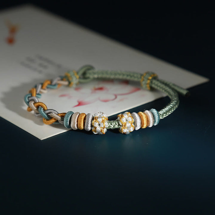 Buddha Stonesの4連桃の花のつながりブレスレット