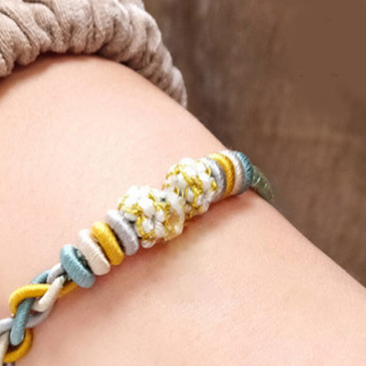Buddha Stonesの4連桃の花のつながりブレスレット