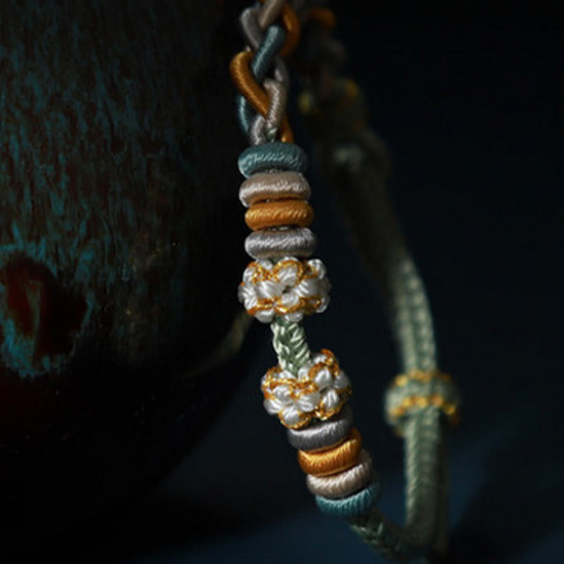 Buddha Stonesの4連桃の花のつながりブレスレット