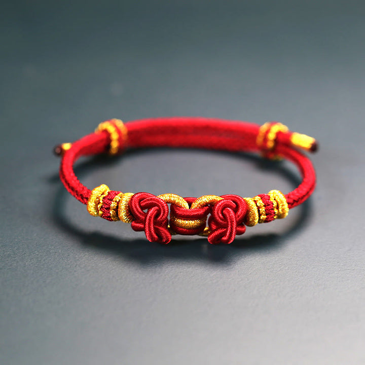 Buddha Stonesの赤い紐のサドルノットの強さのブレスレット