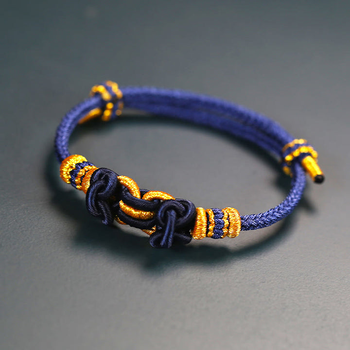 Buddha Stonesの赤い紐のサドルノットの強さのブレスレット