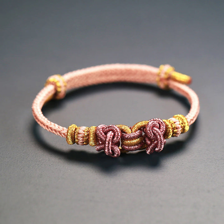 Buddha Stonesの赤い紐のサドルノットの強さのブレスレット