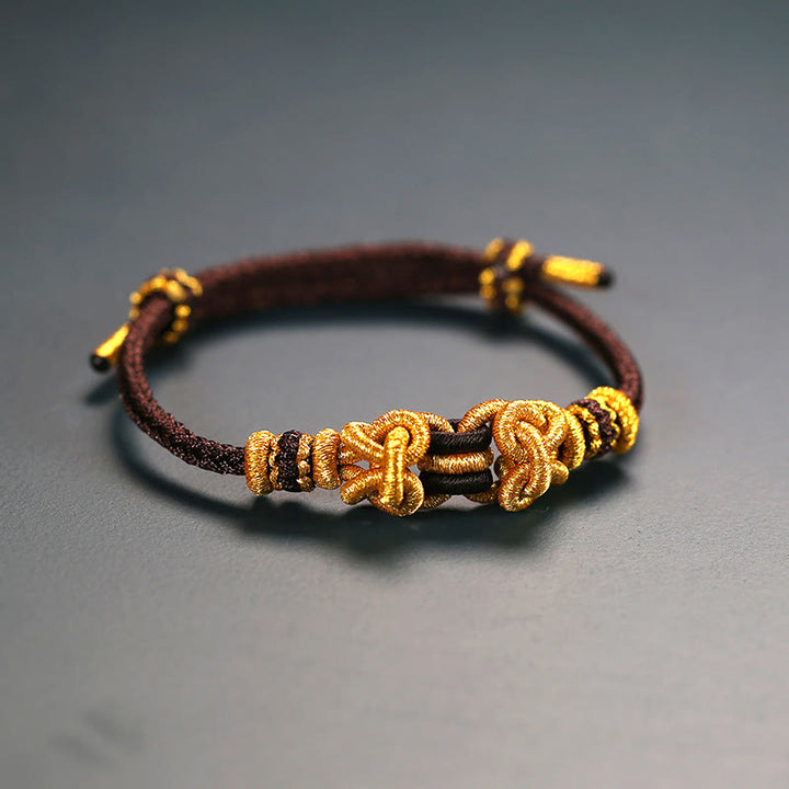 Buddha Stonesの赤い紐のサドルノットの強さのブレスレット