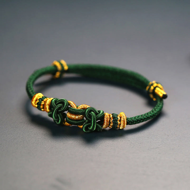 Buddha Stonesの赤い紐のサドルノットの強さのブレスレット