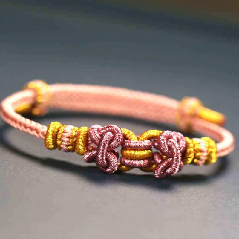 Buddha Stonesの赤い紐のサドルノットの強さのブレスレット