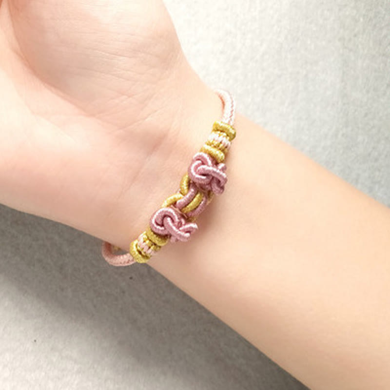 Buddha Stonesの赤い紐のサドルノットの強さのブレスレット