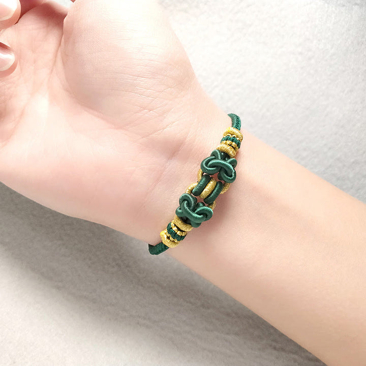 Buddha Stonesの赤い紐のサドルノットの強さのブレスレット