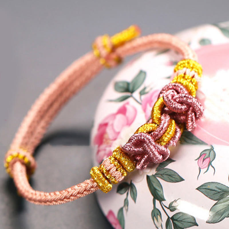 Buddha Stonesの赤い紐のサドルノットの強さのブレスレット