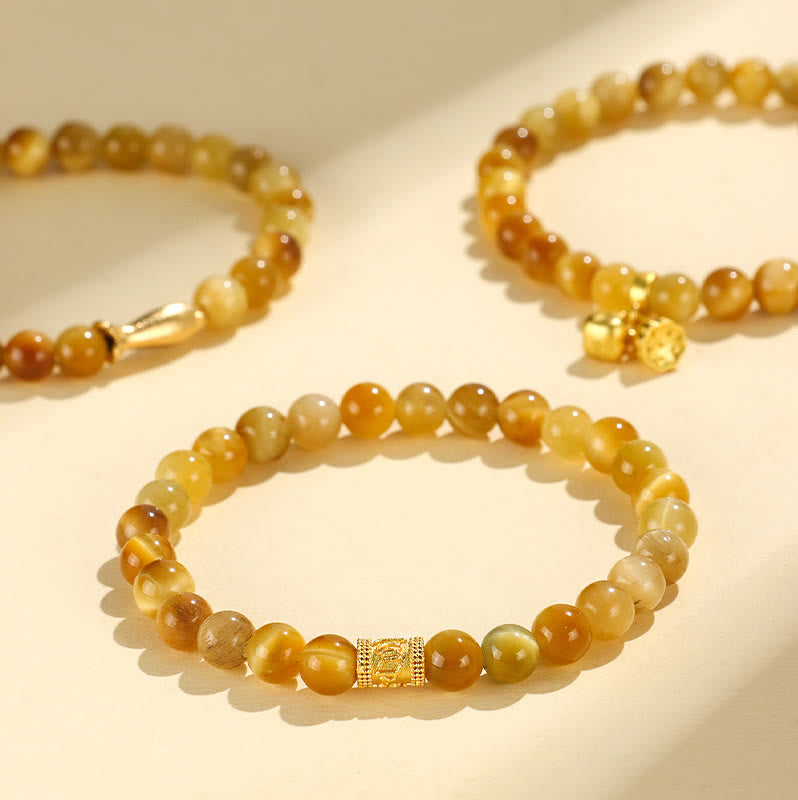 Buddha Stonesタイガーアイフーキャラクター竹鯉魚ロータスオーム・マニ・パドメ・フム守護ブレスレット