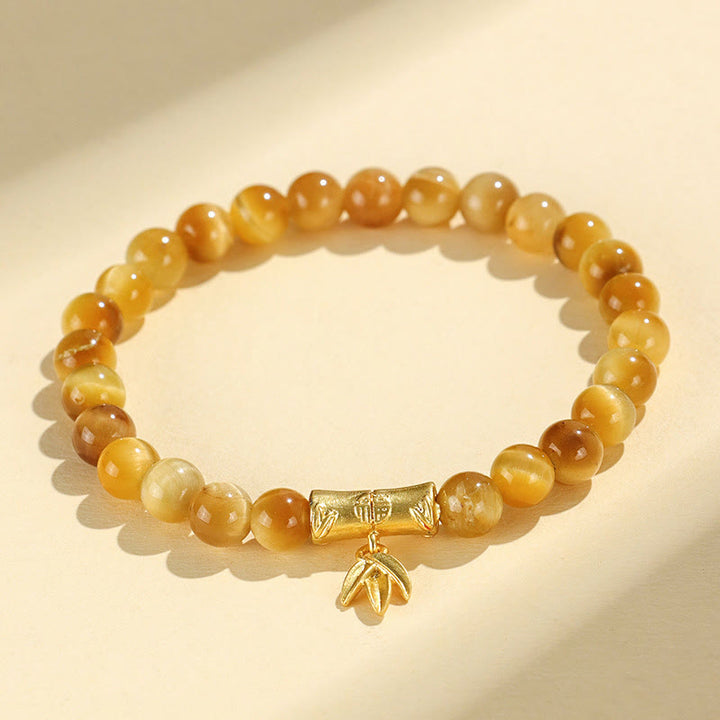 Buddha Stonesタイガーアイフーキャラクター竹鯉魚ロータスオーム・マニ・パドメ・フム守護ブレスレット