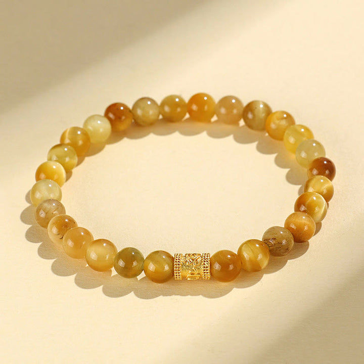 Buddha Stonesタイガーアイフーキャラクター竹鯉魚ロータスオーム・マニ・パドメ・フム守護ブレスレット
