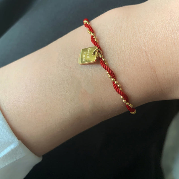 Buddha Stonesの赤い糸、金メッキ銅製、幸運の強さのブレスレット