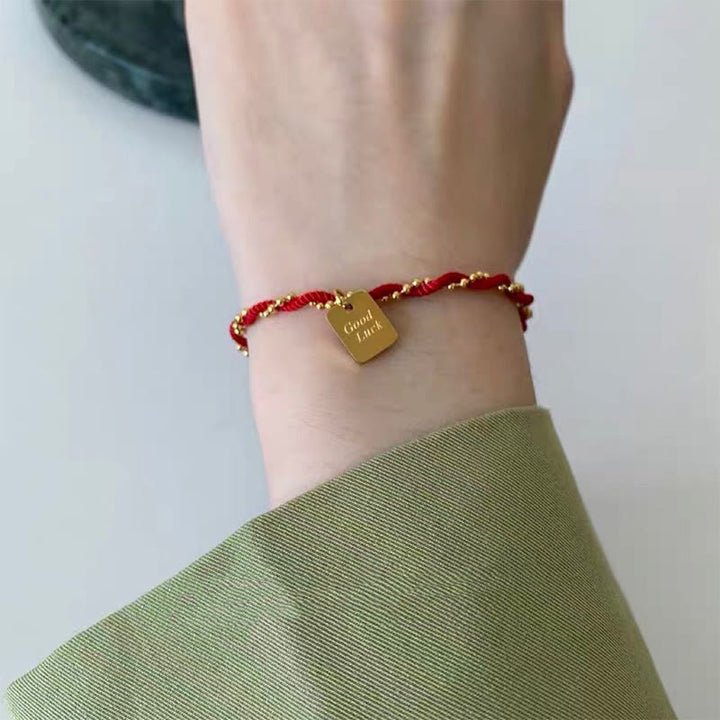 Buddha Stonesの赤い糸、金メッキ銅製、幸運の強さのブレスレット