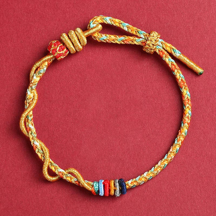 Buddha Stonesの黄色い紐で蛇の年を守る編み込みブレスレット