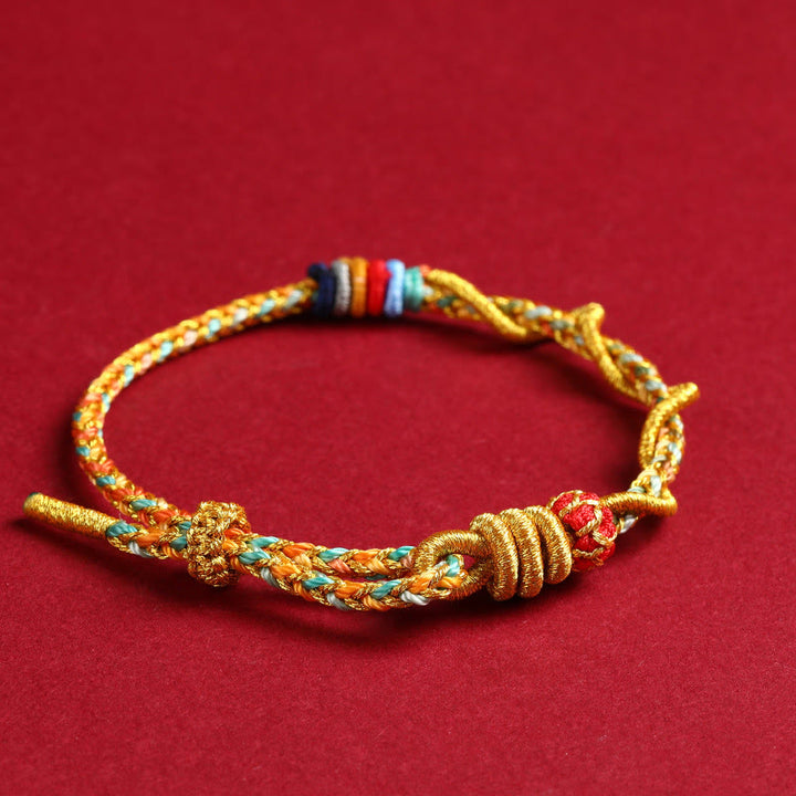 Buddha Stonesの黄色い紐で蛇の年を守る編み込みブレスレット