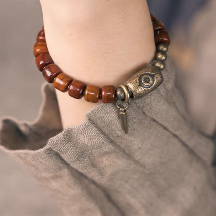 Buddha Stonesヤクの骨Dziシェイプ銅コーンペンダント強度ブレスレット